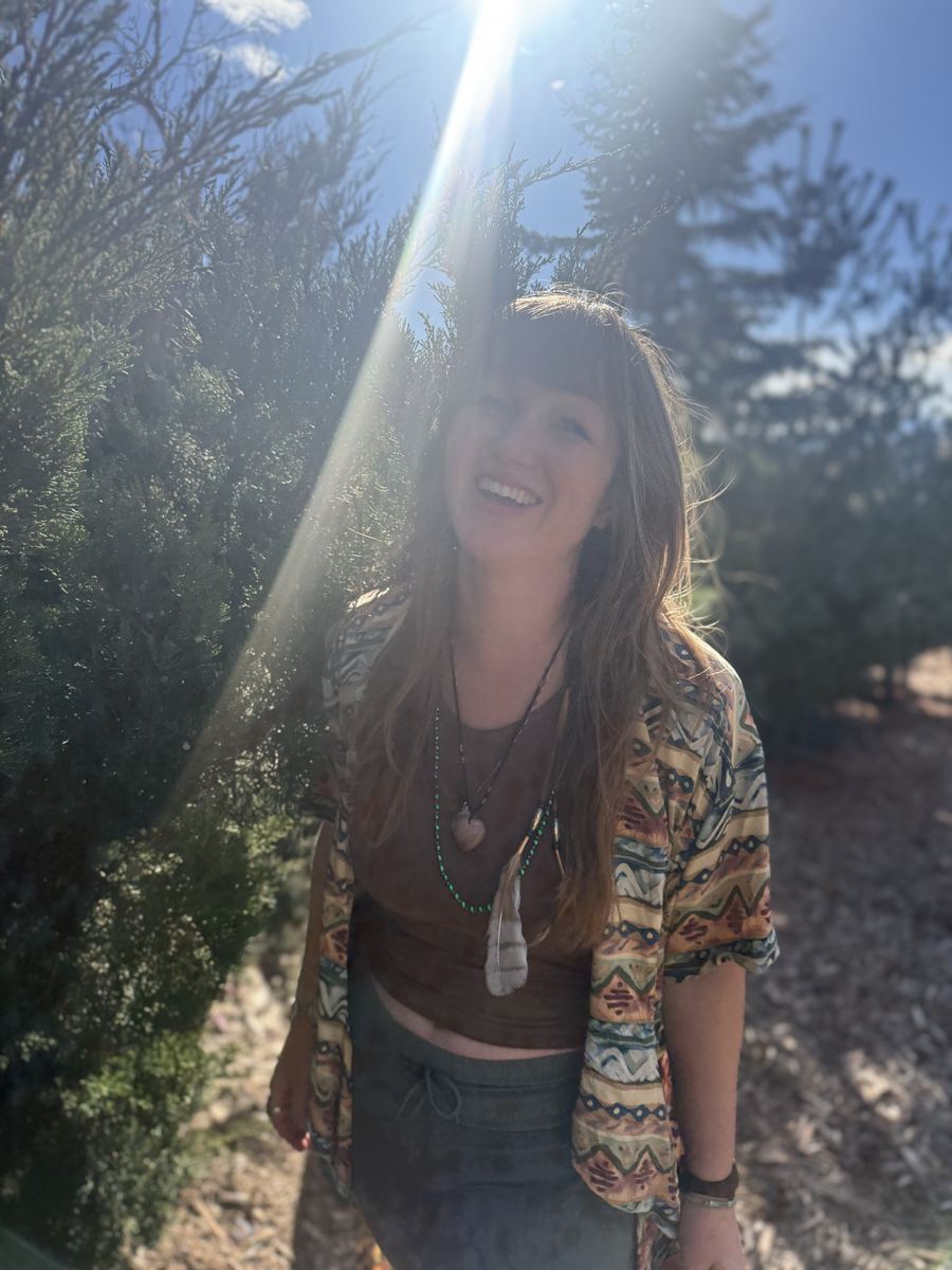 Kristirae in a sunbeam by the junipers